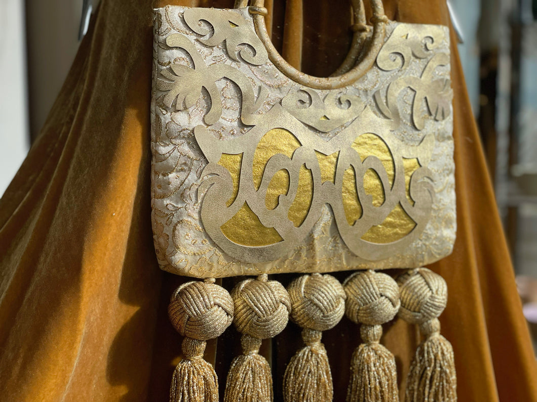 Gold 4 tassel hand bag